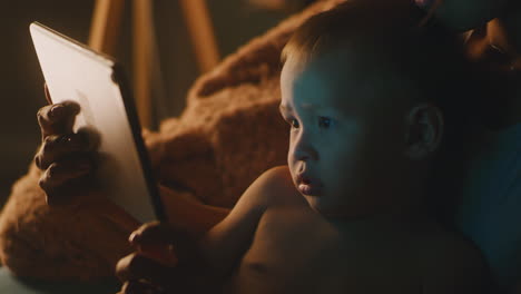 mother and child watching tablet