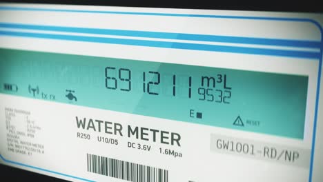 smart water meter display showing volume of cubic liters used by residence