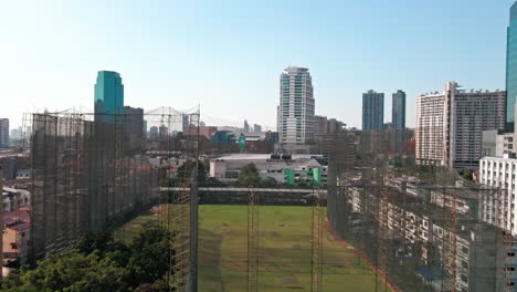 drones fly over the buildings and business districts in bangkok