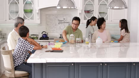 extended family group eating breakfast at home shot on r3d