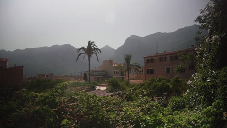 Deia-on-Island-of-Mallorca-in-Spain-with-mountains-in-the-back