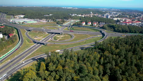 high panning drone view: major highway intersection