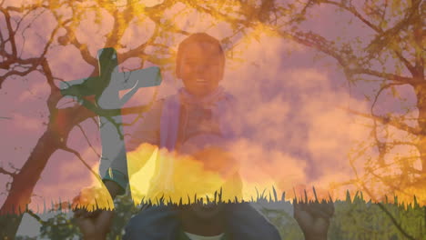 animatie van een christelijk kruis over een vader en zijn zoon die samen spelen