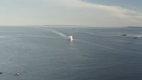 push in while panning of ferry coming towards camera