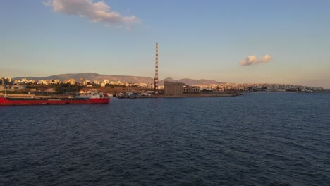 aerial - flying towards drapetsona above the sea