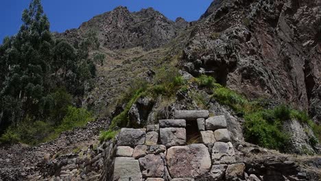 static shot of the entrance area to the ruins of ollantaytambo in the sacred valley of the incas - cuzco