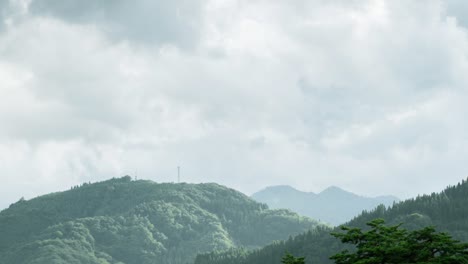 timelapse of clouds over mountains