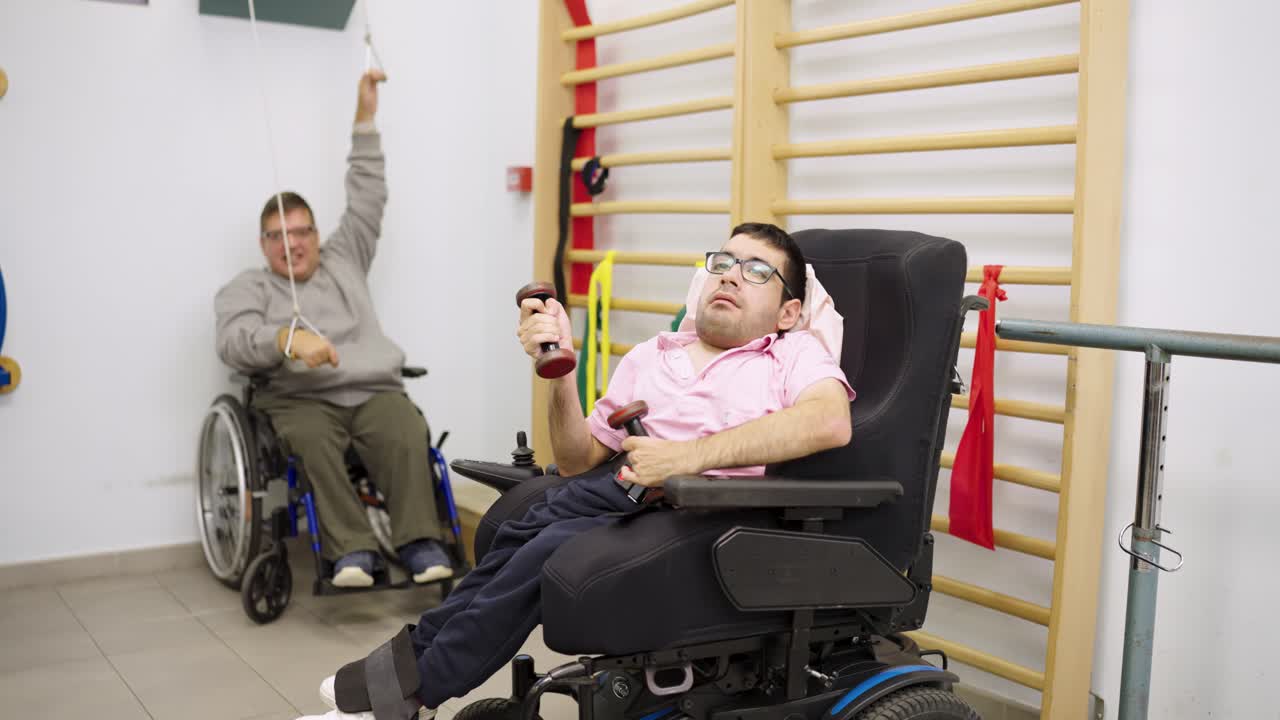 People in wheelchairs doing physical therapy