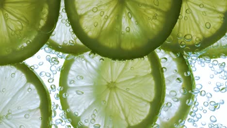 Lime-Slices-falling-deeply-under-water.-Shot-on-super-slow-motion-camera-1000-fps.