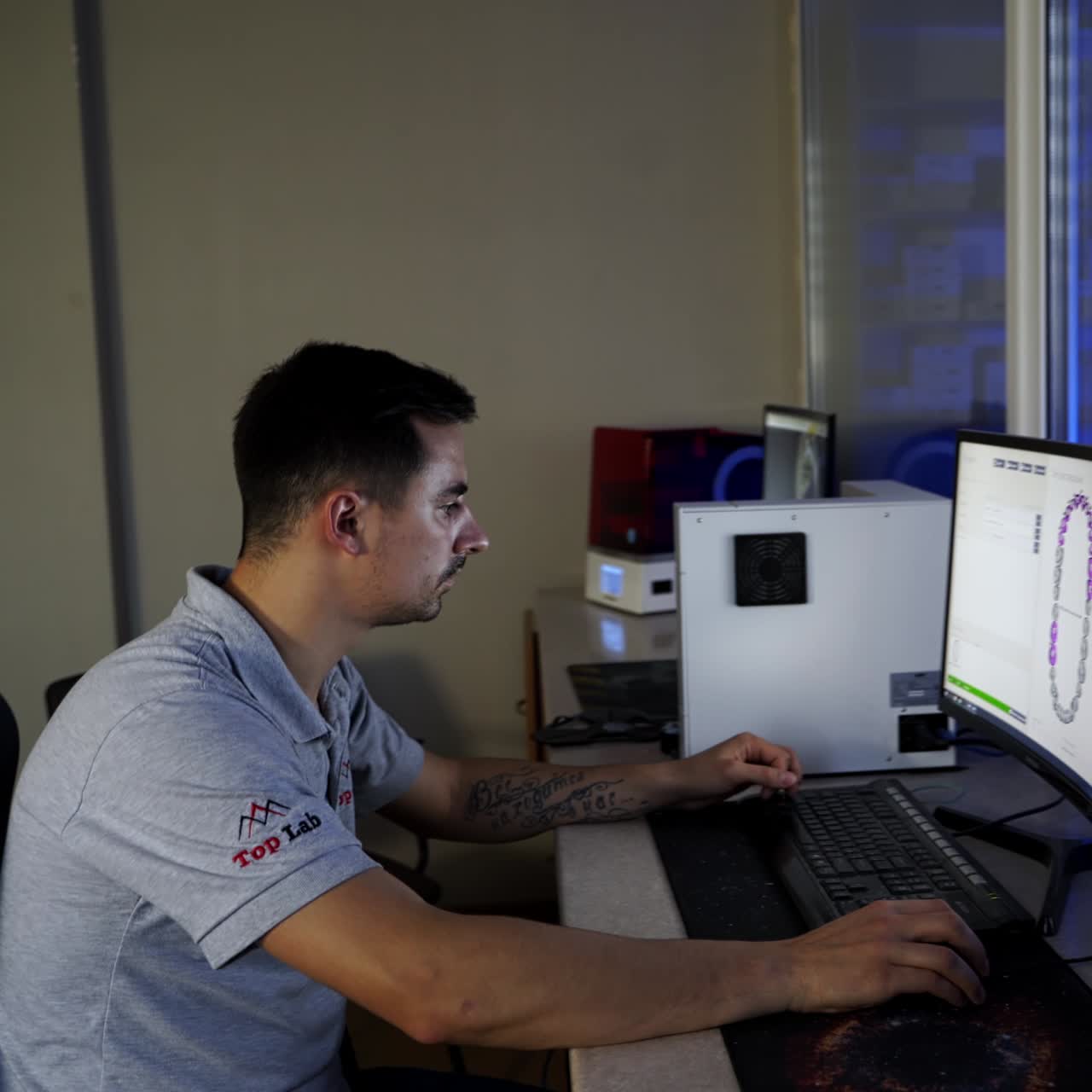 Technician dentist construction crown. Dental technician in the process of work