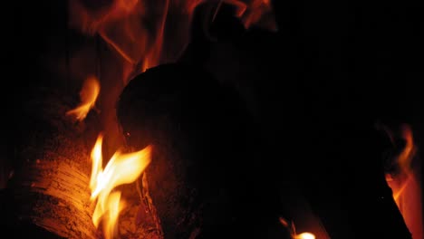 Burning-Flame-At-Fireplace-on-wooden-logs