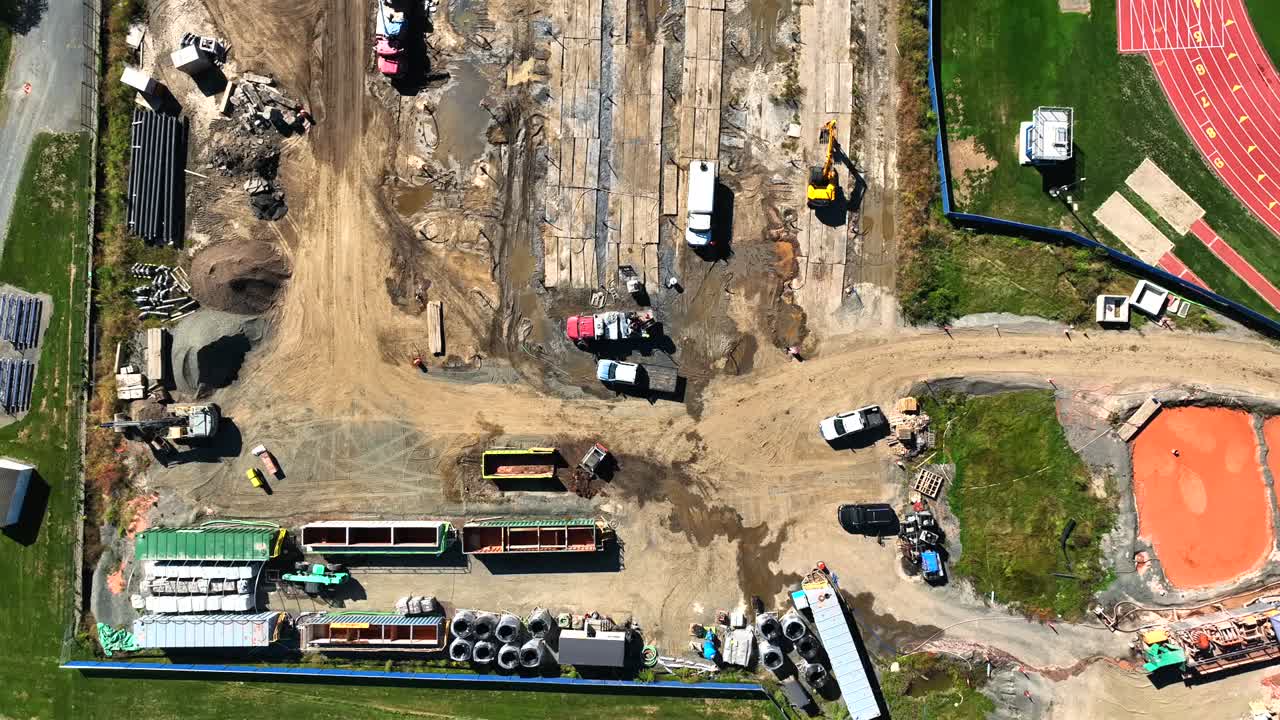 Aerial View of Construction Site with Heavy Equipment