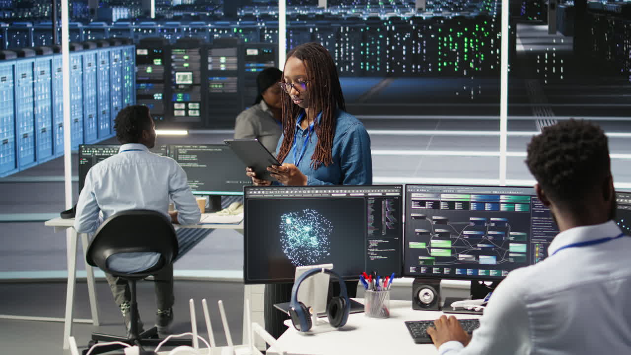 Woman in server hub using AI visualization insights on tablet device