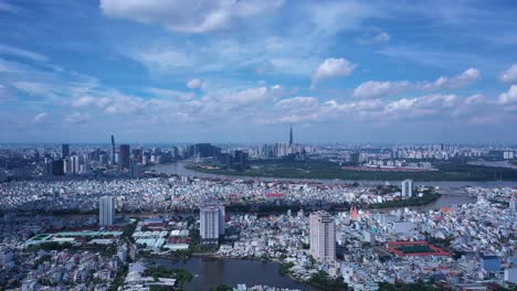 ho chi minh city drone crane shot ascending on sunny day with blue sky and moving clouds