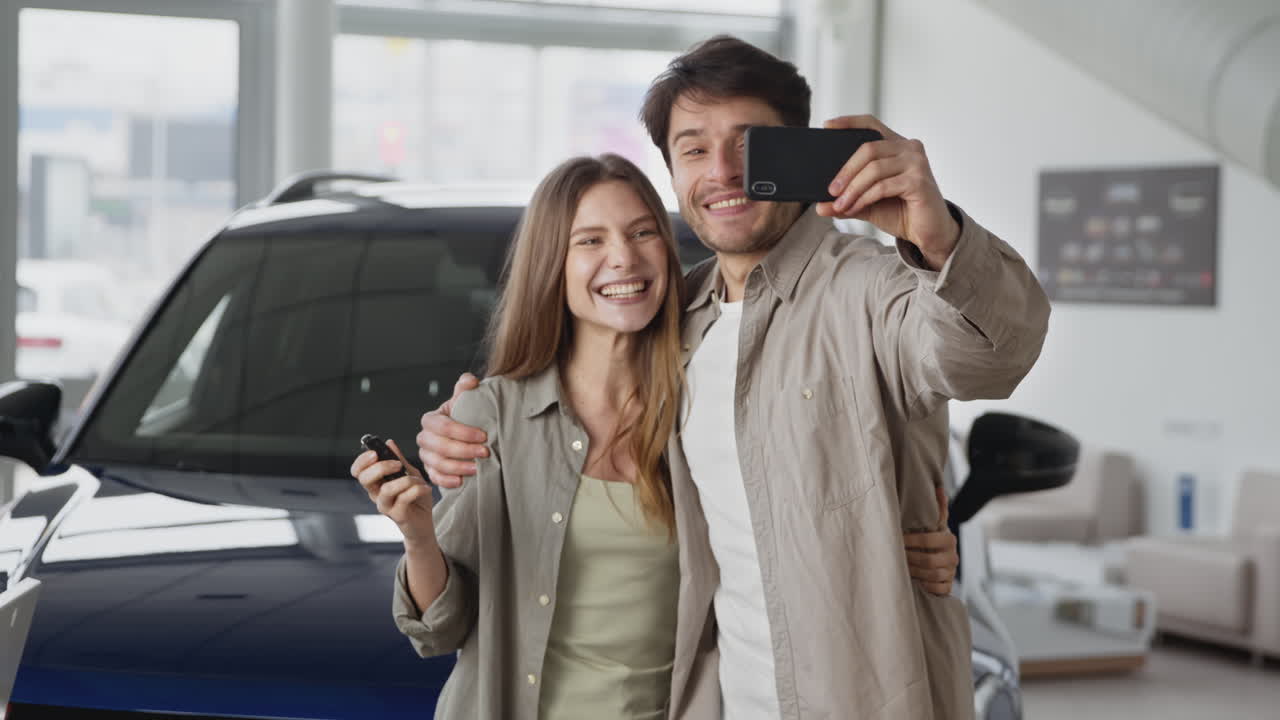 Happy Couple Celebrating New Car Purchase