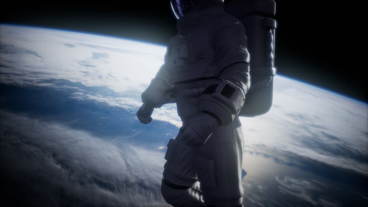 Astronaut in outer space against the backdrop of the planet earth