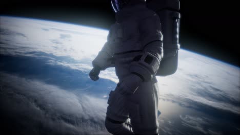 astronauta en el espacio exterior contra el telón de fondo del planeta tierra