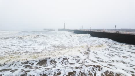 very mist and foggy scene on the coast of the uk