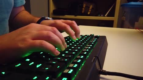 typing on a green gaming keyboard