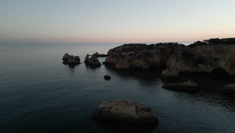 Drone-Video-of-Sunset-on-the-Coast-of-the-Algarve,-Portugal