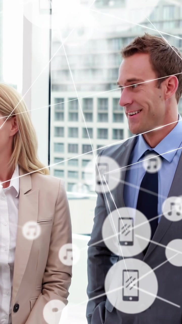 Video verticale: Team che osserva icone del telefono apparire ed espandersi, generando spostamenti dello sguardo per il business.