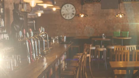 puntos brillantes de luz contra el interior de un bar moderno