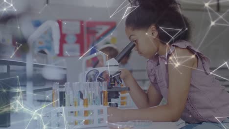 animation of connections over biracial schoolgirl using microscope in science class