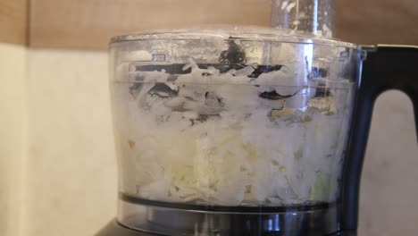 chopping onions in a food processor