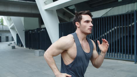 close up male runner jogging outdoor