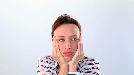 Worried-woman-standing-against-white-background-4k