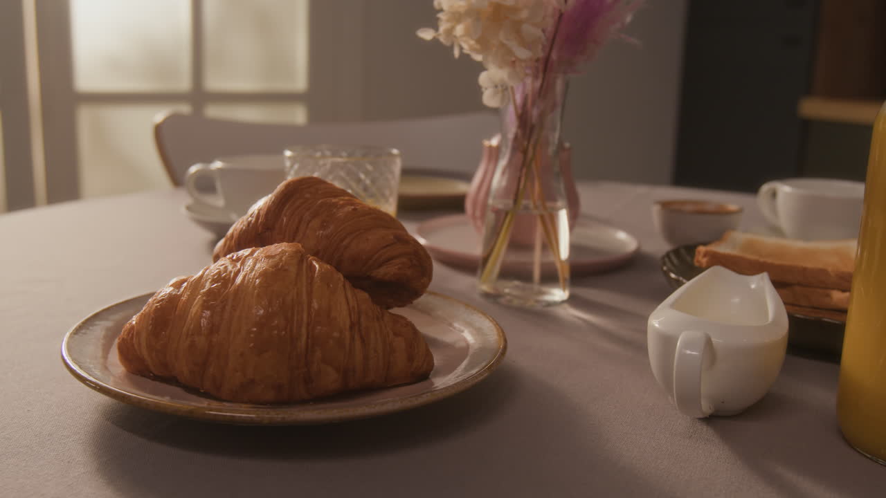 Breakfast with Croissants and Orange Juice