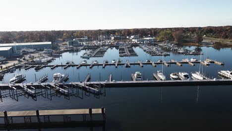 sideways motion, tracking the calm water near a half empty marina close to winter