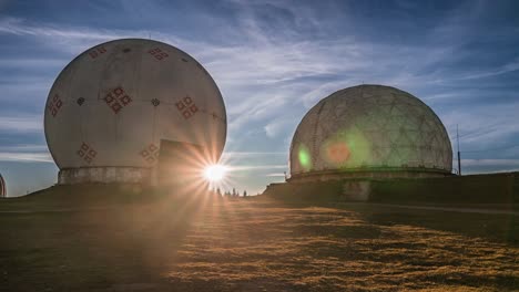 time-lapse with old military station. view on abandoned radar station pamir with spherical roofs. time lapse video with cool clouds and perfect sunset.