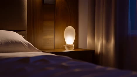 bedroom with nightstand lamp