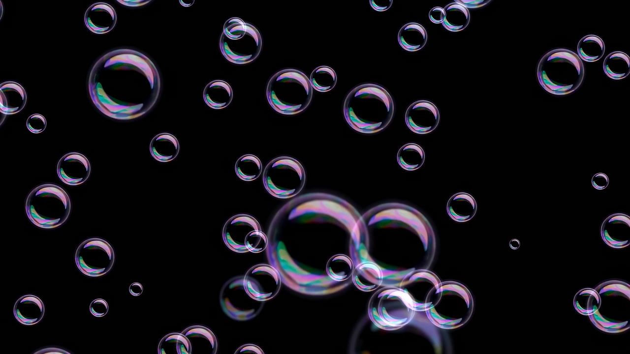 Floating Soap Bubbles On Black Background, Iridescent Spheres Drift Slowly Across Frame Creating Playful