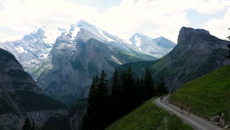 walking between the stunning mountains in the alps of switzerland