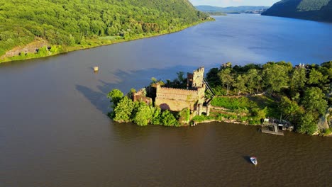 aerial drone footage of an abandoned castle on a small island