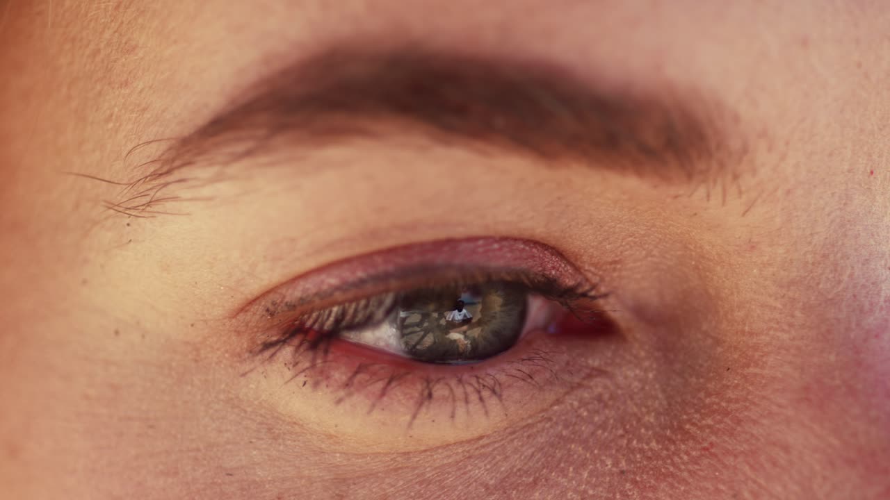 Extreme Close-up Of Caucasian Woman's Eye Outdoor Looking Away. Macro Shot