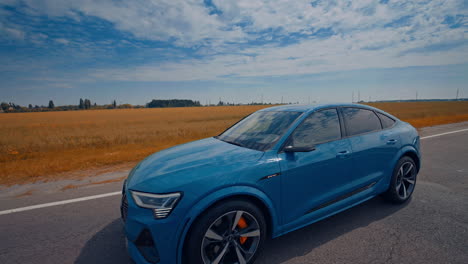 new audi on highway road. audi e-tron shows his unbelievable speed on highway road