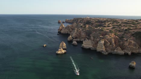 Aerial-view-of-Ponta-da-Piedade-rock-formations-in-Lagos,-Portugal