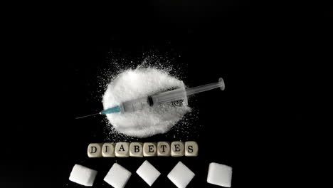 una jeringa de insulina cayendo en una pila de azúcar junto a cubos de azúcar y dados que deletrean la diabetes