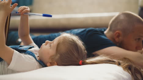 close-up-little-pretty-daughter-in-blue-denim