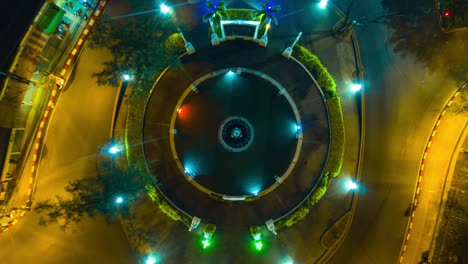 night illuminated phuket island beach town traffic circle aerial down view 4k time lapse thailand