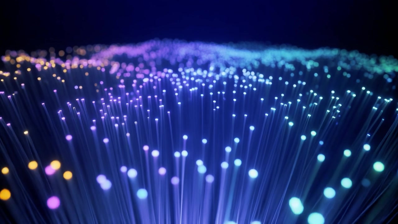 Glowing Fiber Optic Cables Transmitting Data