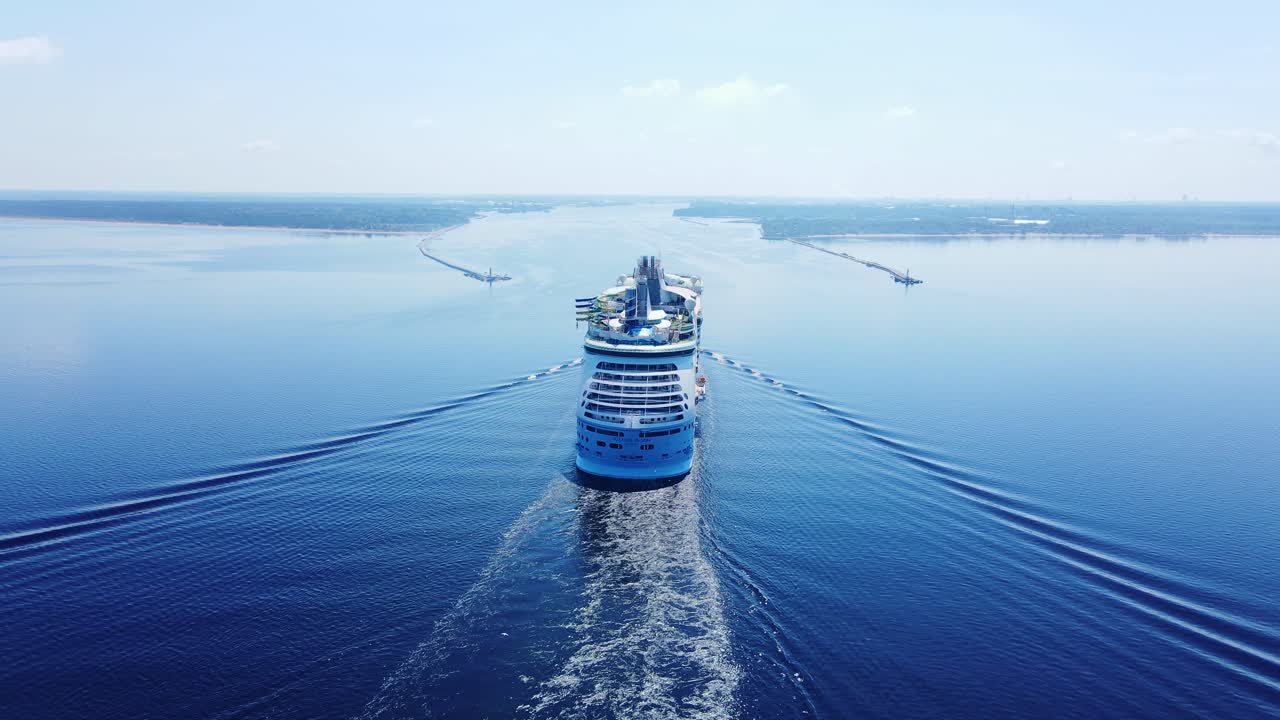 Drone capture cruise ship nearing sea gates, Gulf of Riga at Daugava River mouth