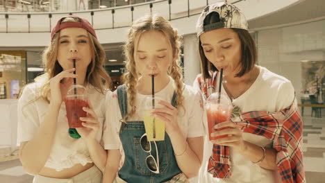 friends enjoying drinks at the mall