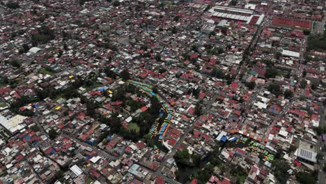 xochimilco's canals, trajineras, and unesco heritage zone from a drone's bird's-eye perspective
