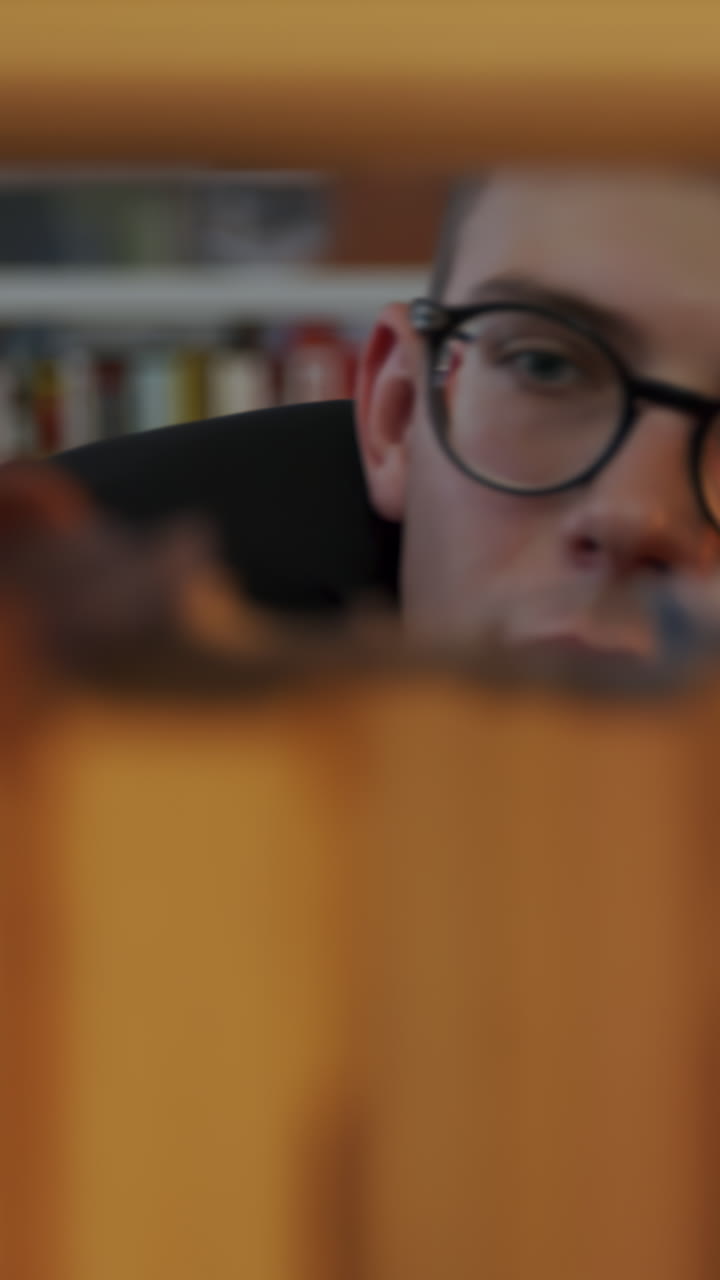 Person Reading in Library