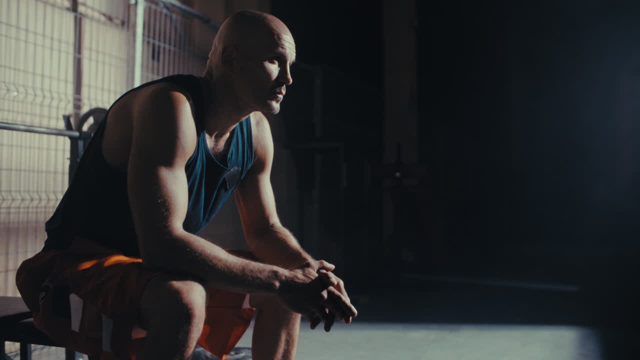 Athlete resting in gym