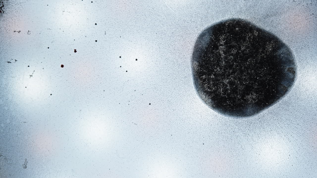Macro shot of ink mixing, abstract patterns, calm and creative mood
